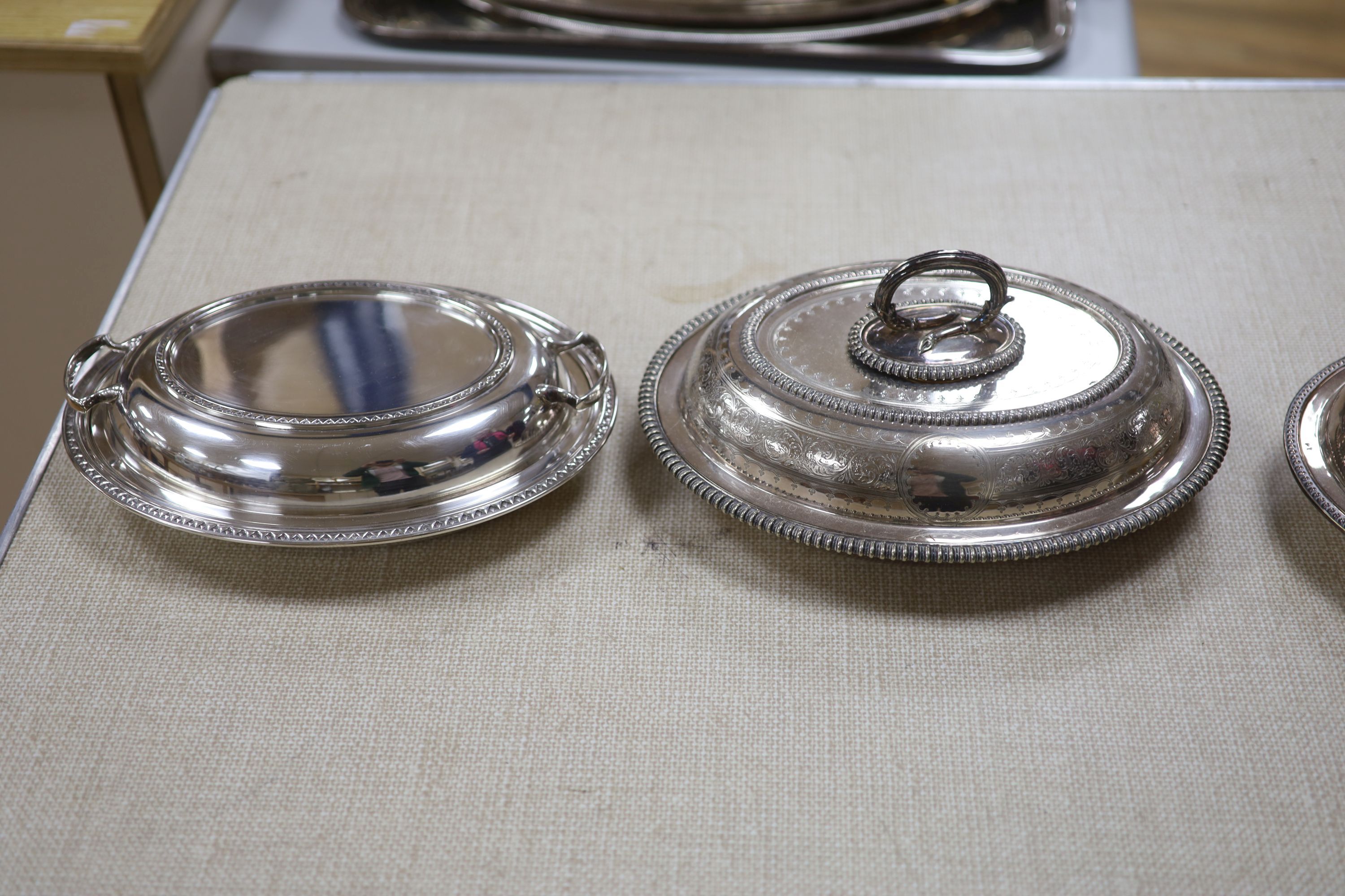 A large quantity of mixed plated wares including tureens and covers